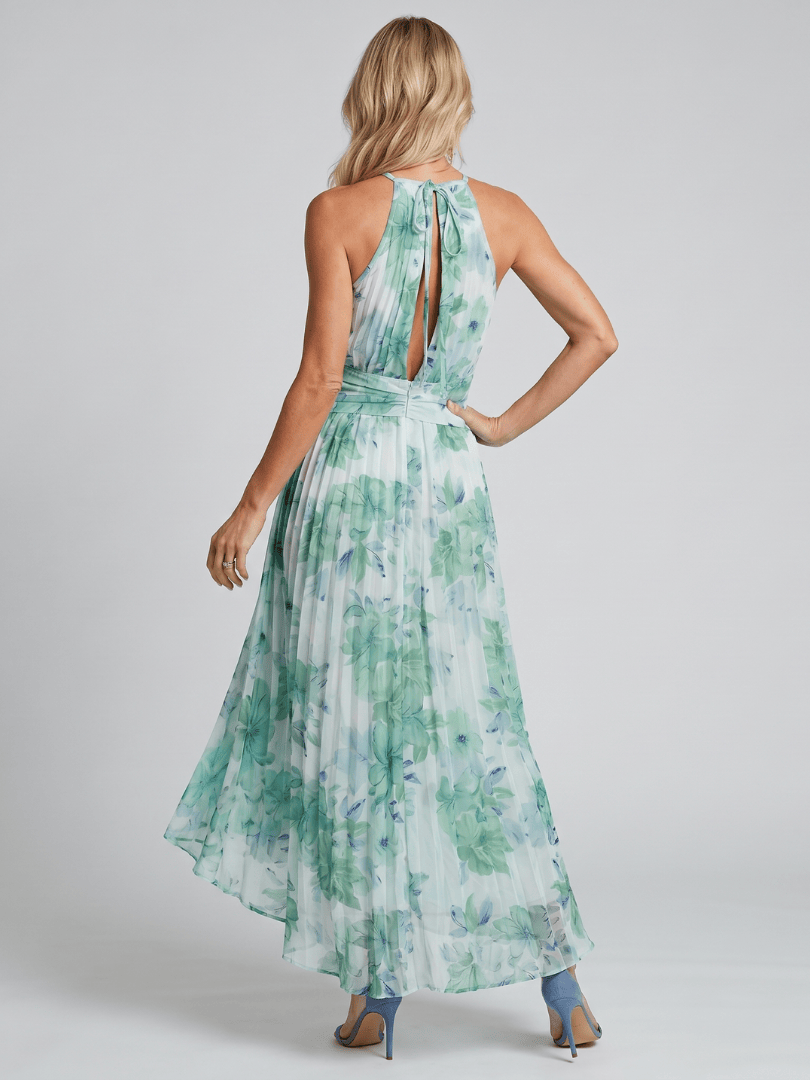 Close-up of the pleated fabric on a halter neck maxi dress