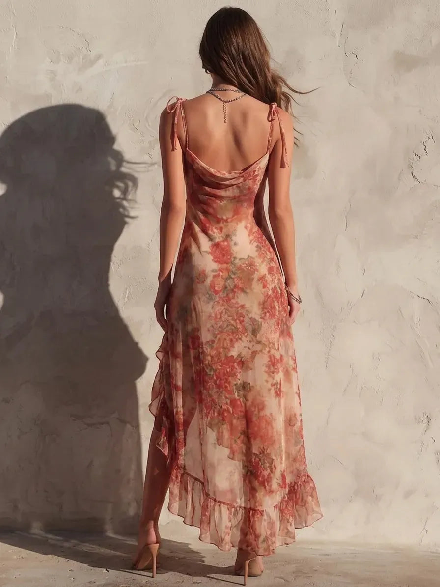 Full-length view of a women's floral midi dress with a flowing midi hem