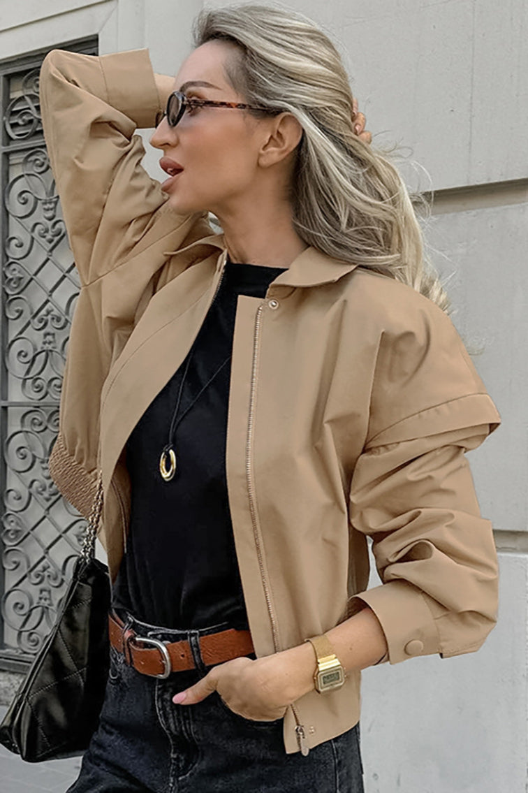 Front view of a khaki biker coat with a relaxed silhouette