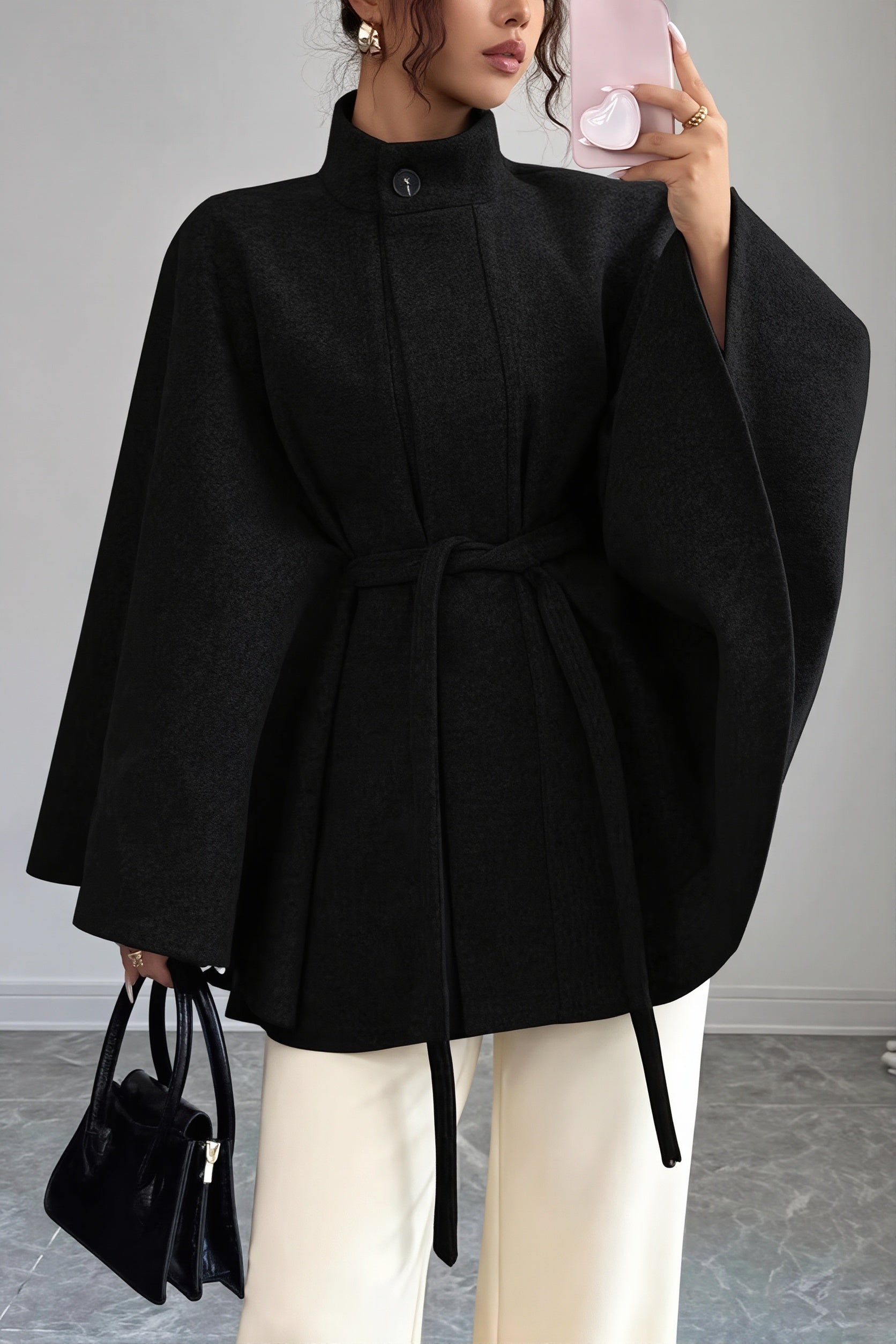 Women's belted cape sleeve wool-look jacket shown from the front