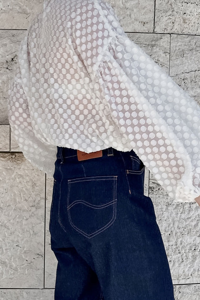 White balloon sleeve blouse styled as a polished everyday outfit