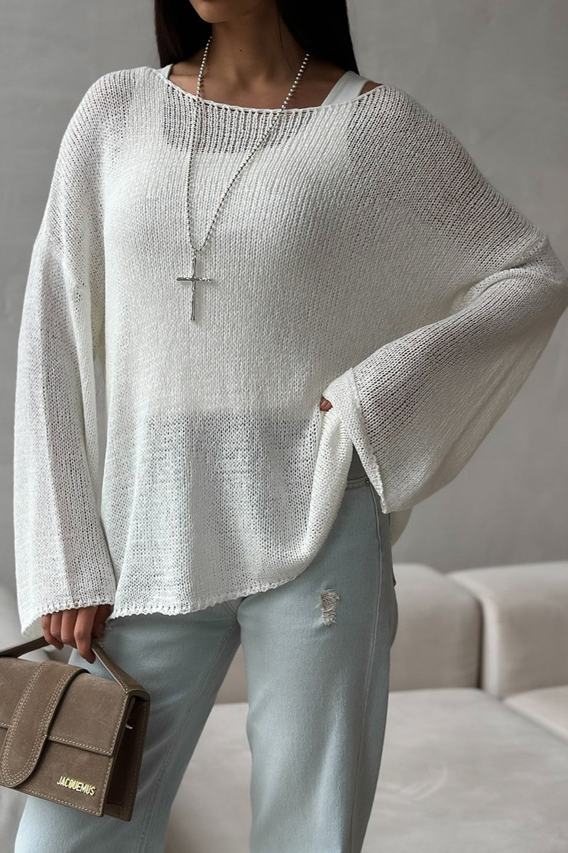 Back view of the relaxed open-knit sweater