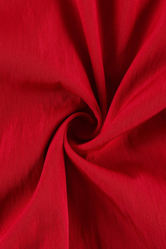 Close-up view of the high neck and drawstring details
