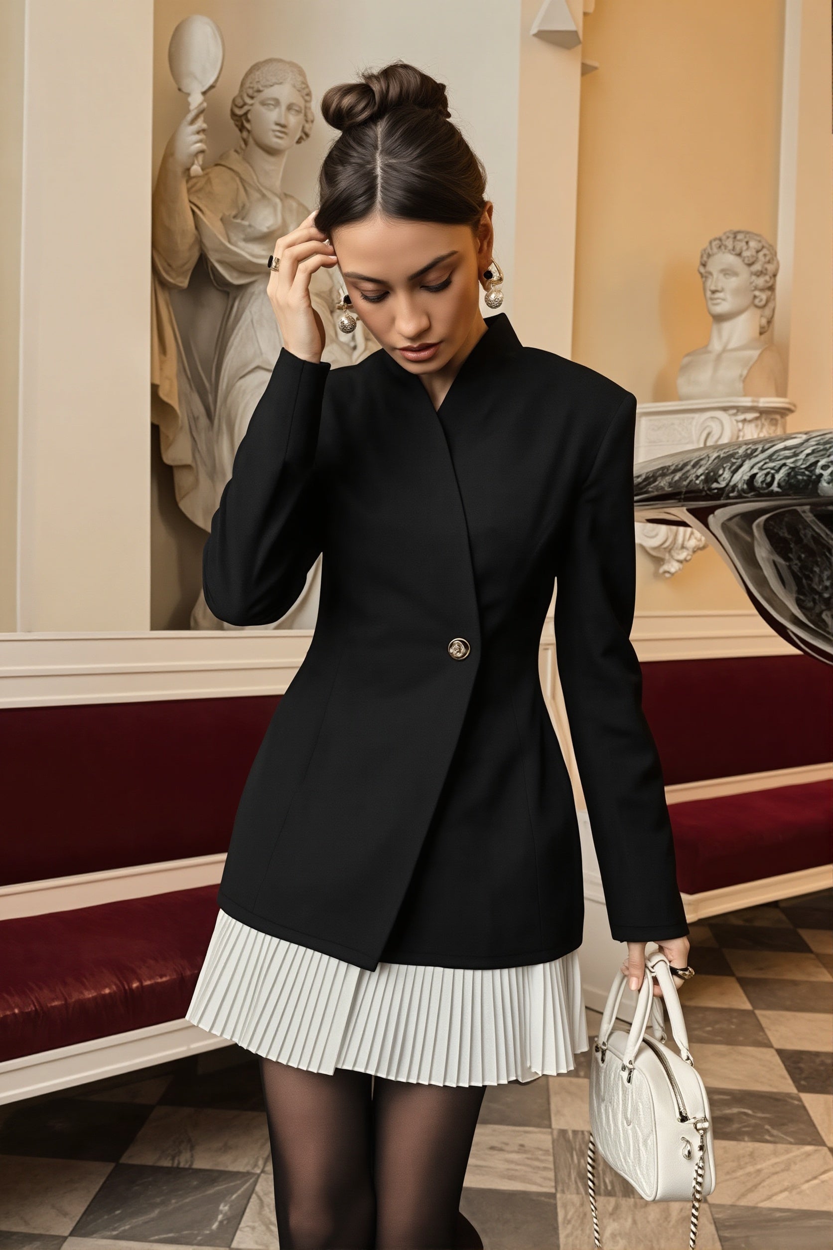 Three-quarter view showing the tailored blazer-style neckline