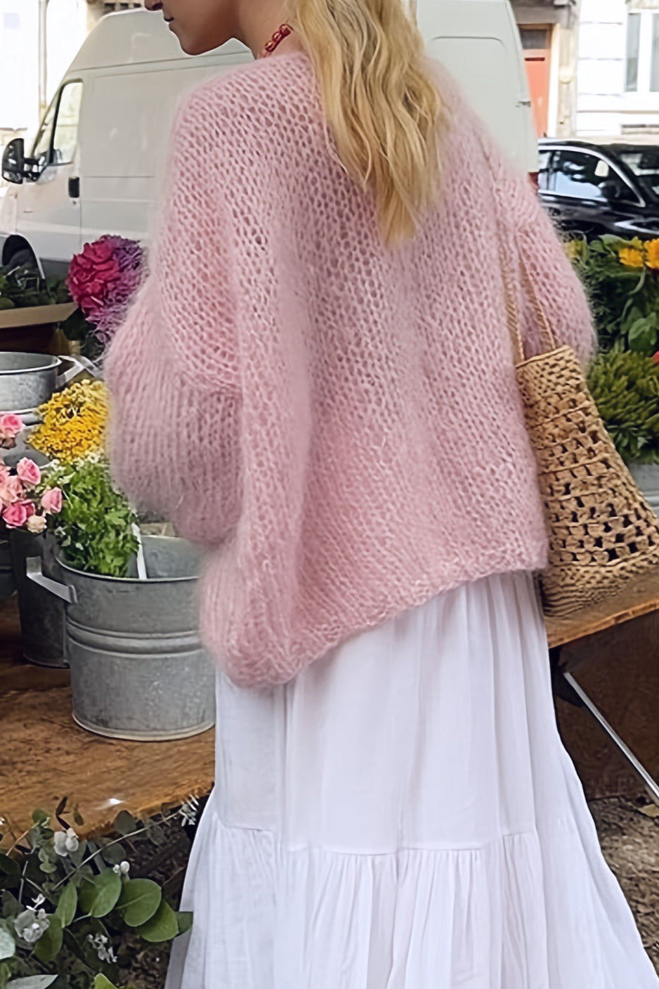 Fuzzy crew neck sweater styled in a casual layered outfit