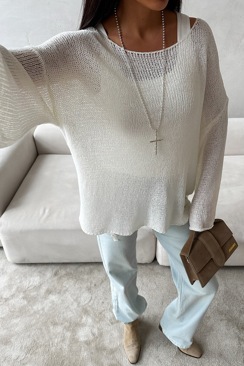 Women's off-shoulder sweater styled as a versatile layering piece