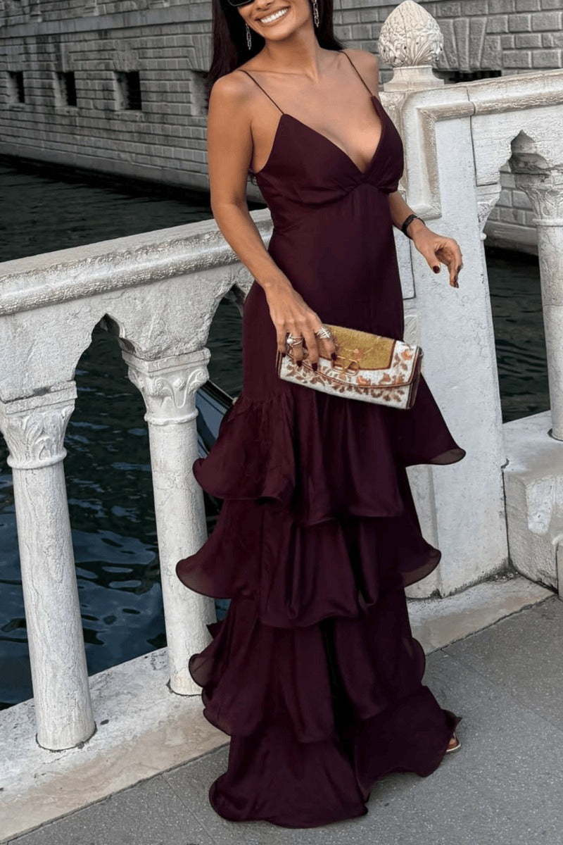 Side view of an elegant burgundy floor-length maxi dress