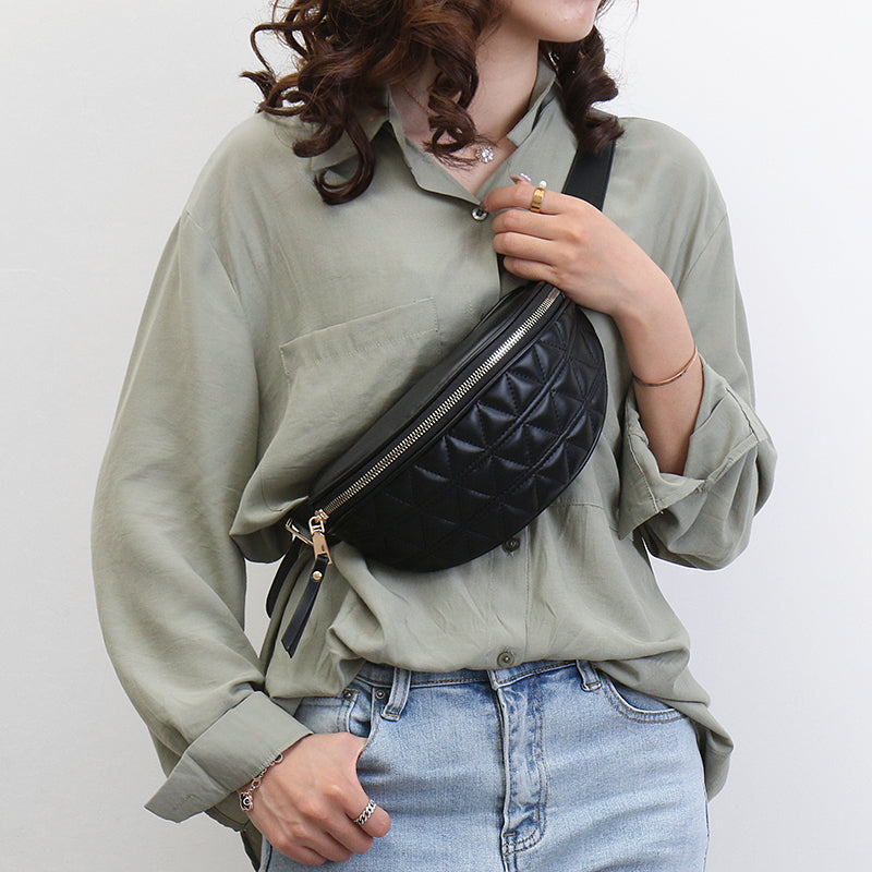 Quilted belt bag crossbody with adjustable strap shown from the front