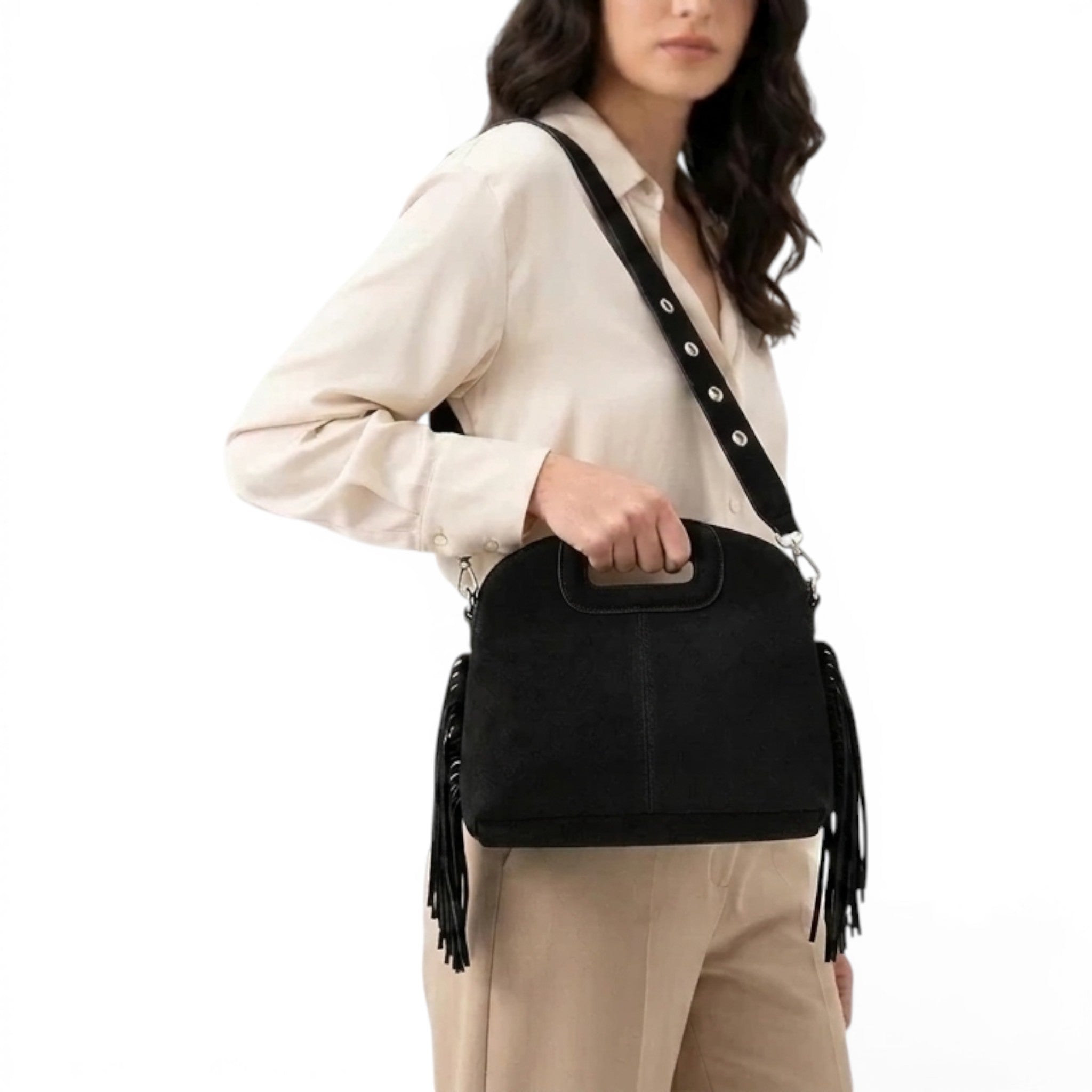 Small bohemian crossbody purse with fringe detail and shoulder strap