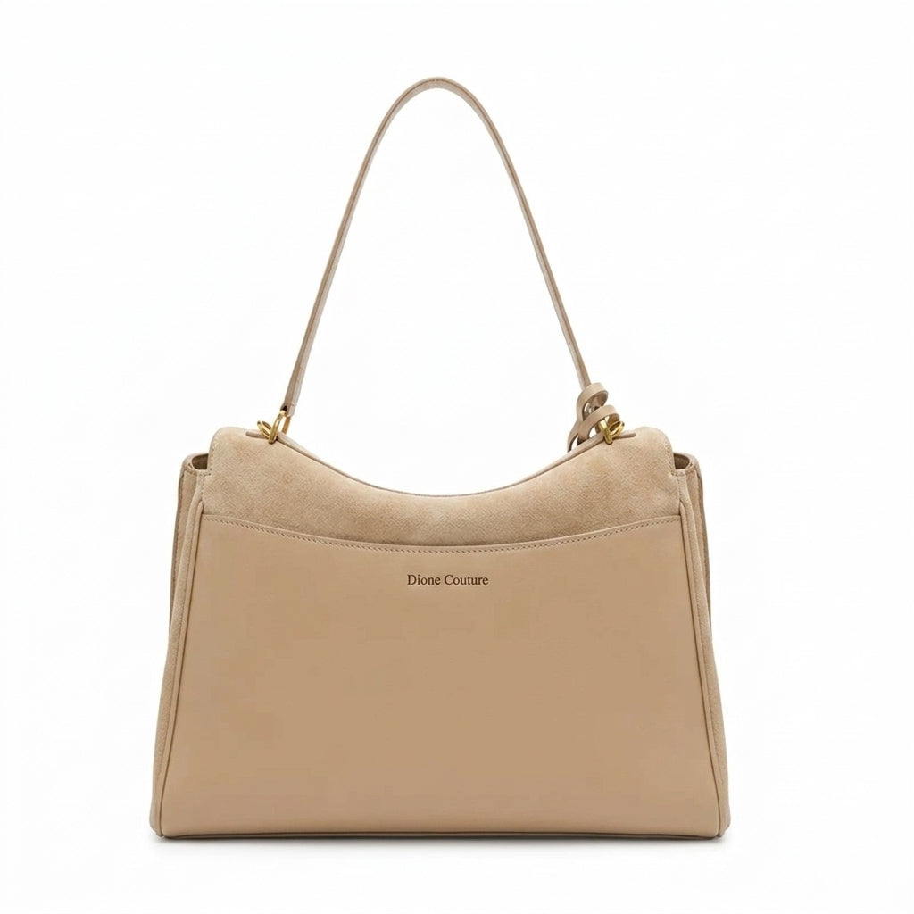 Beige suede tote bag shown from an angled view with double shoulder straps