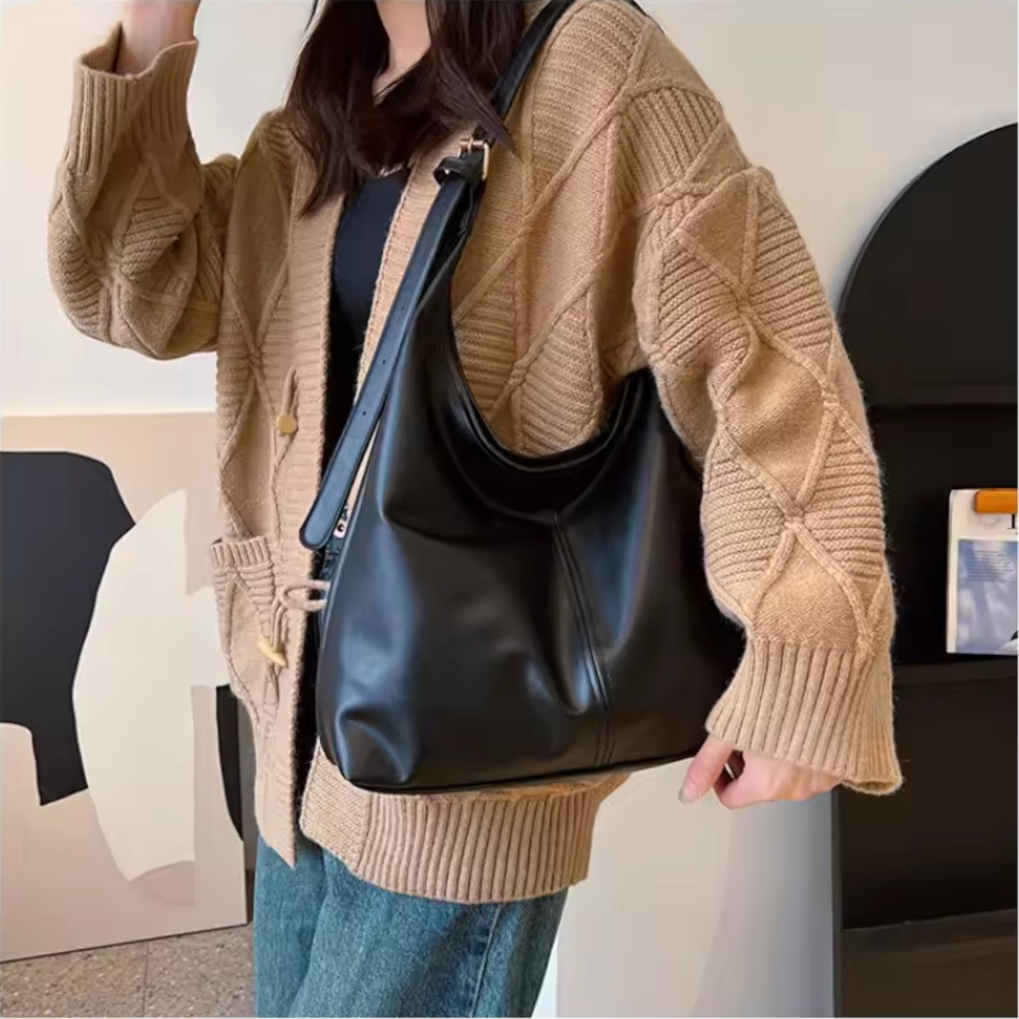 Large soft tote bag with clean lines and shoulder straps