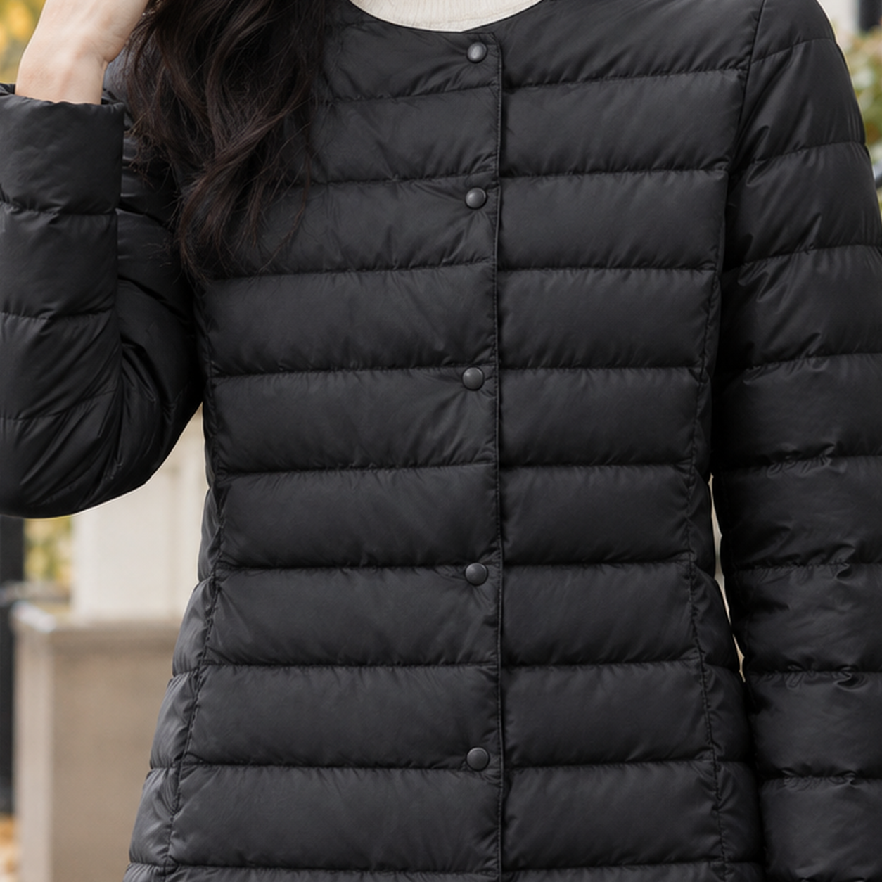 Quilted down jacket displayed in a full front view