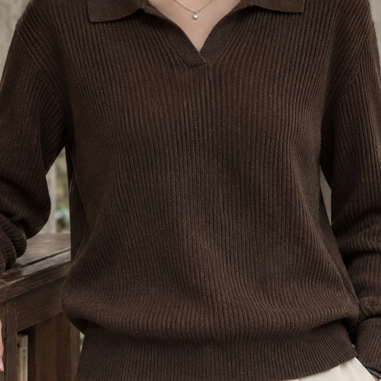 Close-up of the ribbed knit texture and polo collar
