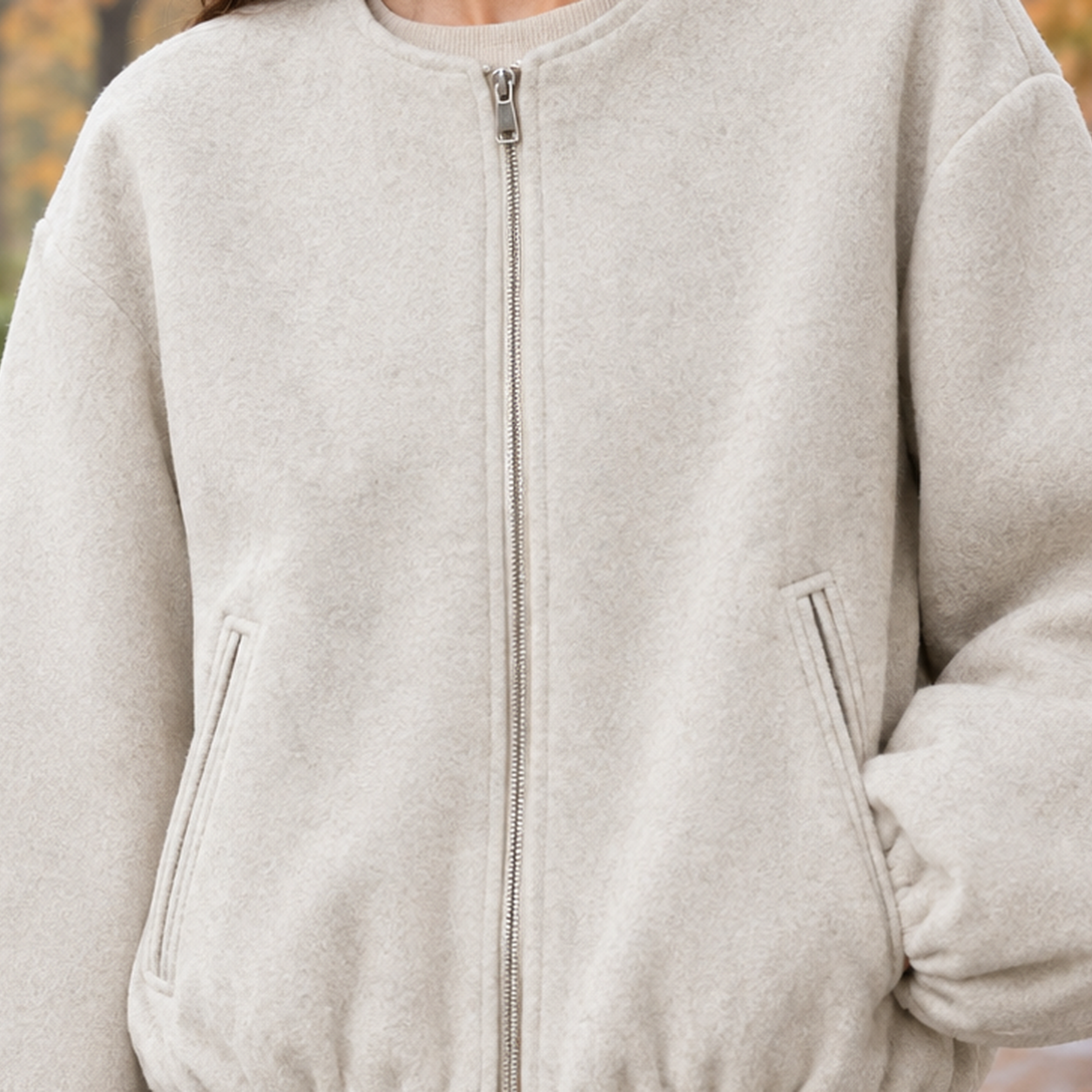 Balloon sleeve jacket shown from the back with voluminous sleeves
