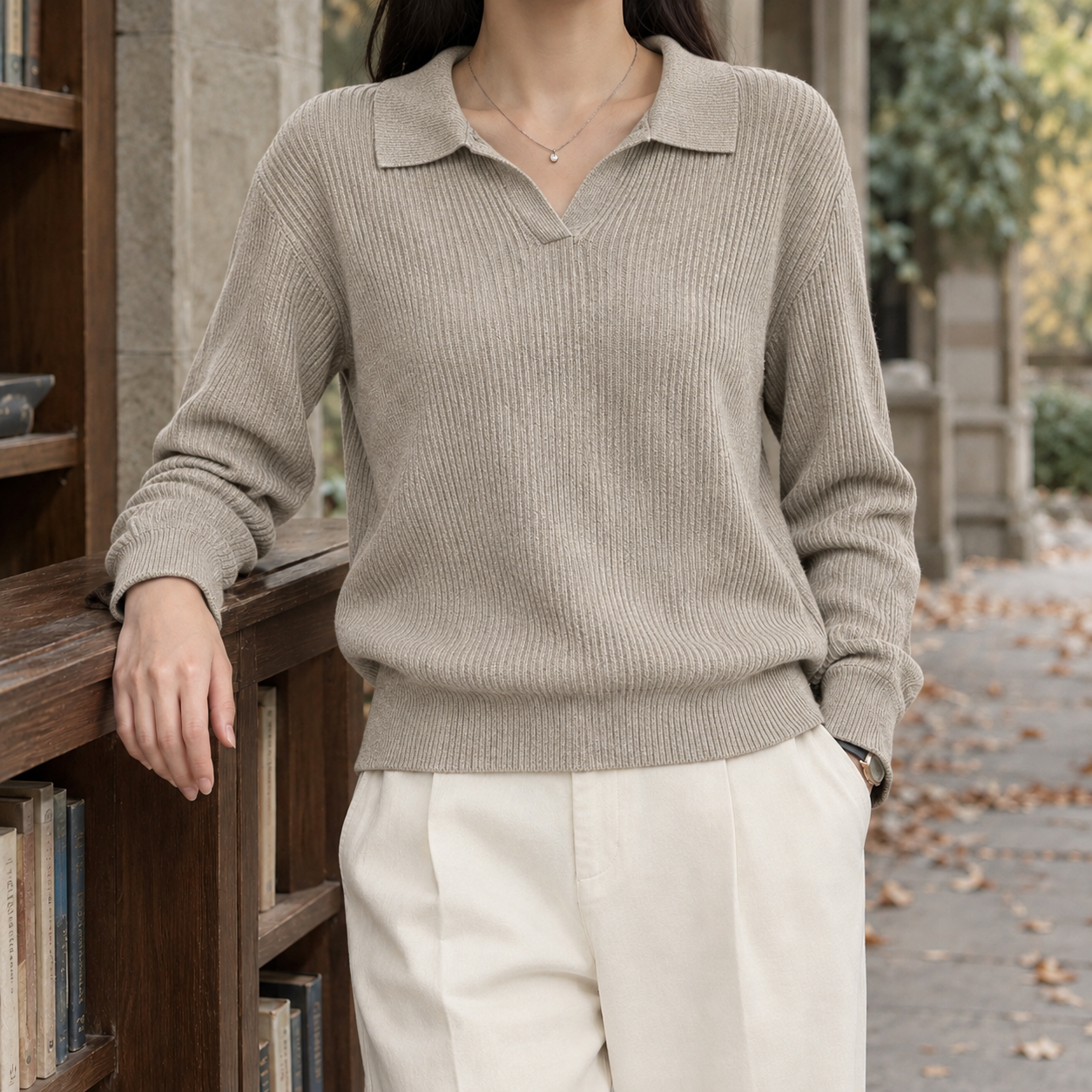 Side view of the ribbed polo collar sweater and long sleeves