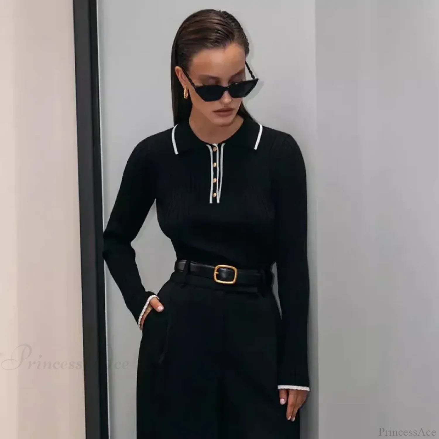 Long sleeve patchwork colorblock sweater styled for a casual outfit.