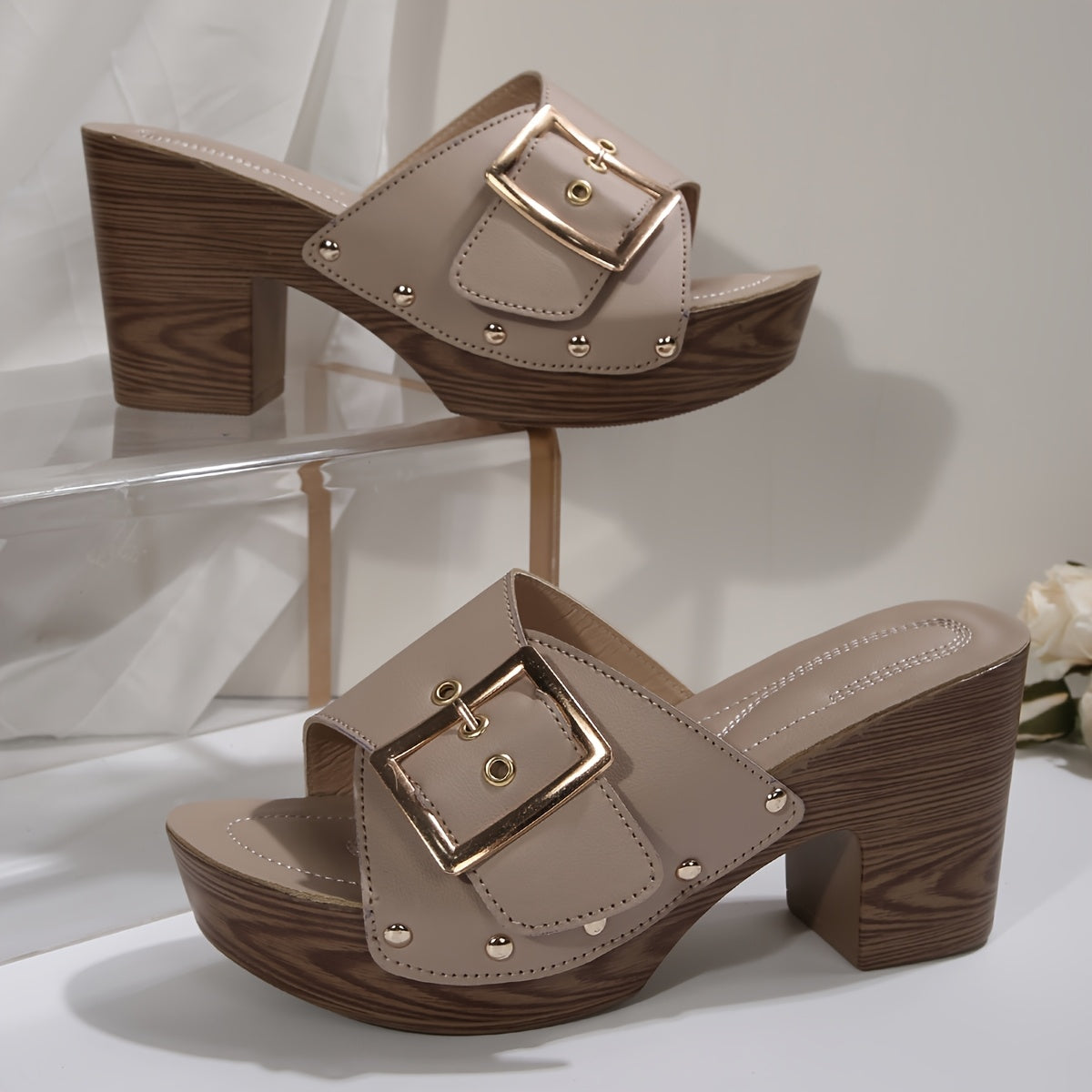 Close-up of the buckle strap on women's platform mule sandals