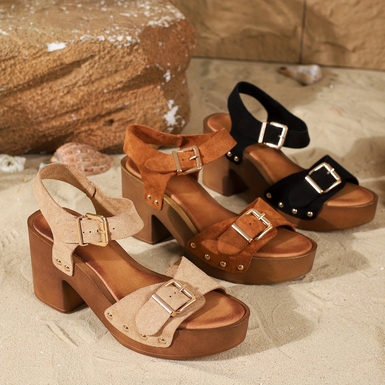 Pair of platform sandals with ankle straps displayed together