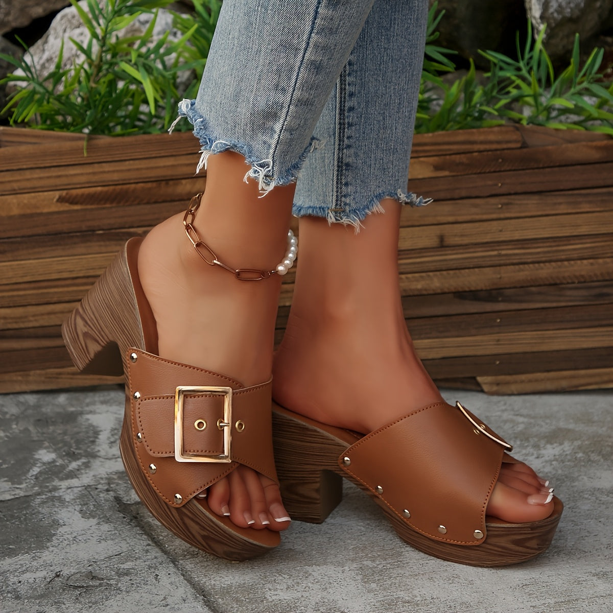 Full product view of women's platform mule sandals with buckle straps