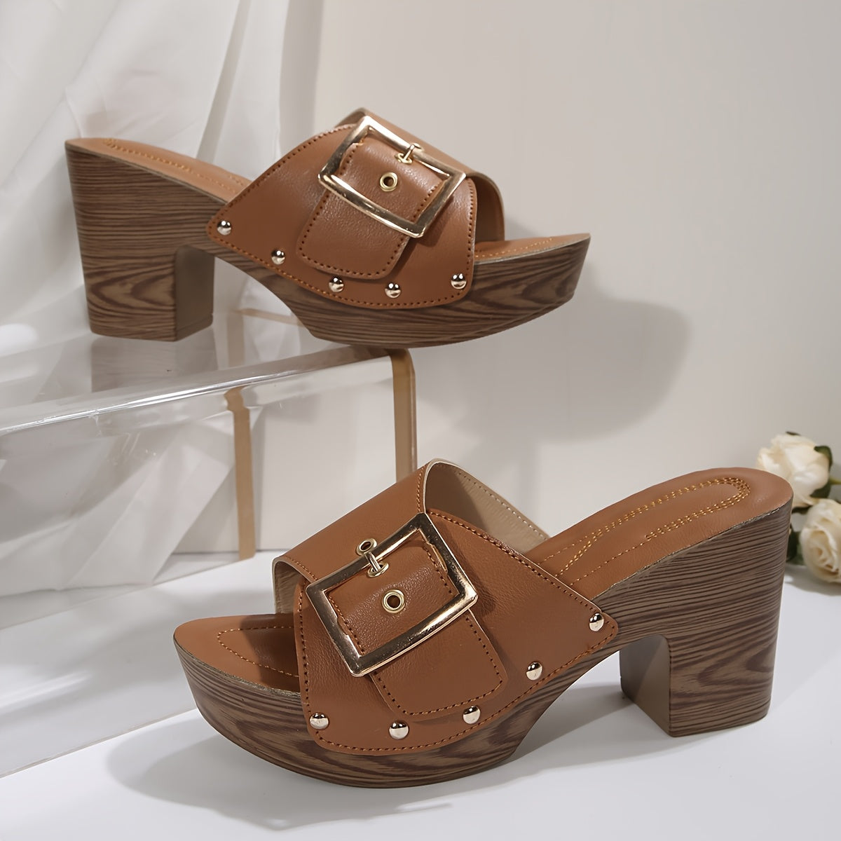Women's platform mule sandals styled as casual warm-weather footwear