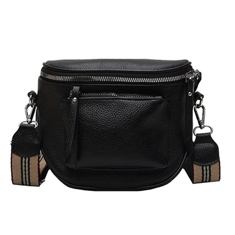 Open leather crossbody bag showing interior storage space