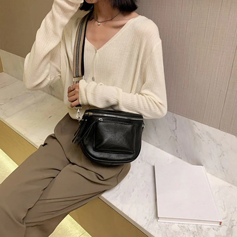 Leather crossbody bag styled for everyday work and weekend wear