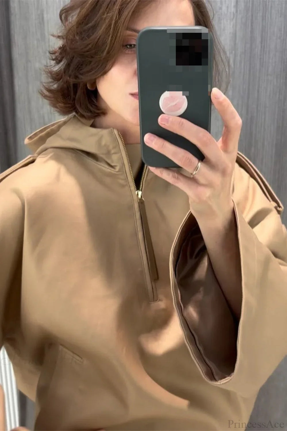 Back view of a solid color stand-collar hoodie jacket