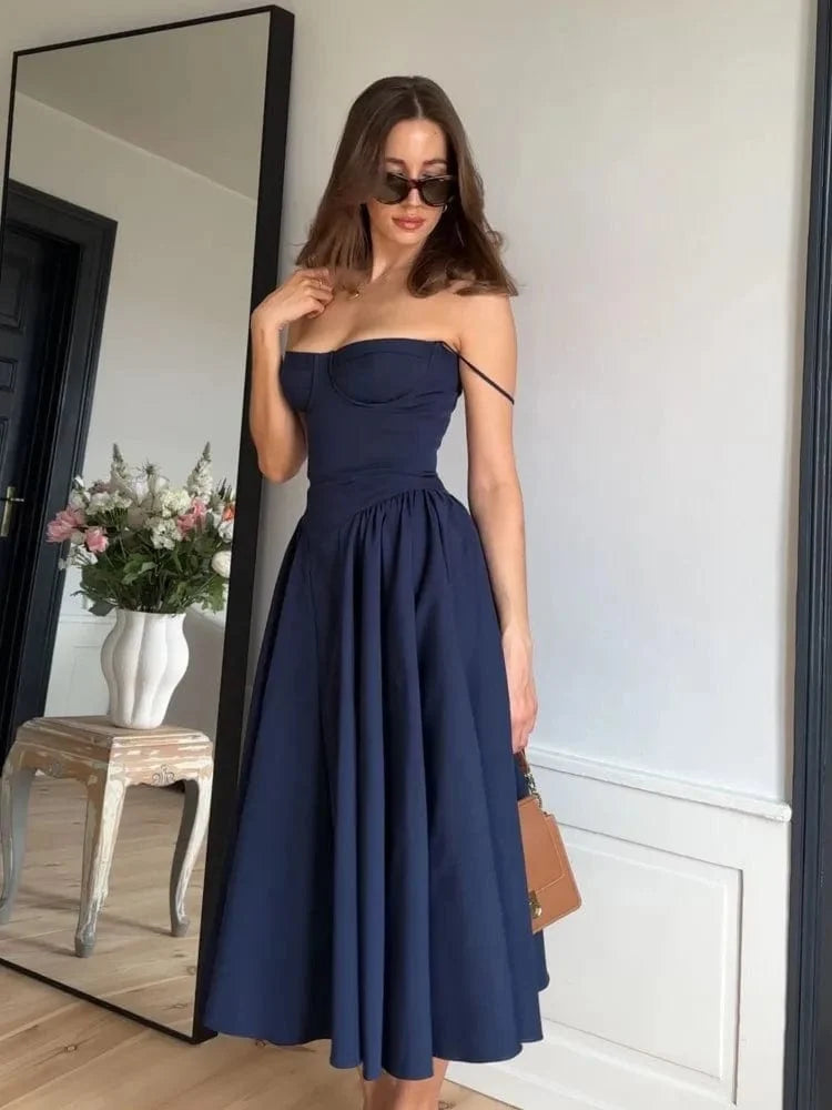 Navy midi dress featuring a structured corset top and elegant midi-length skirt