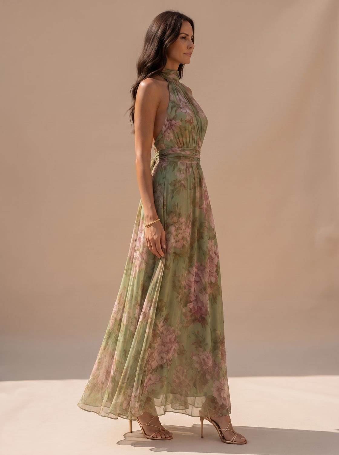 Back view of a women's halter neck chiffon maxi dress