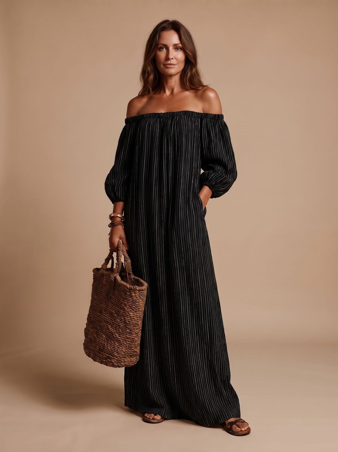 Side view of a women's boho striped off-shoulder maxi dress