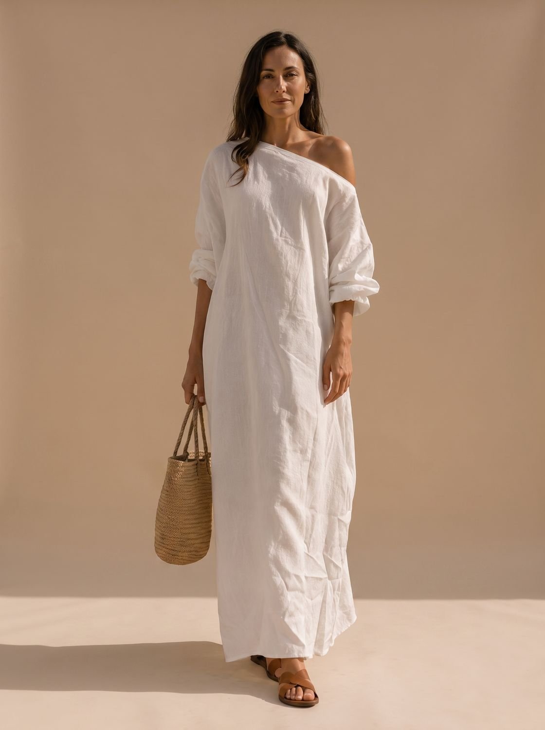 Women's one-shoulder linen maxi dress shown from the front with a flowing silhouette