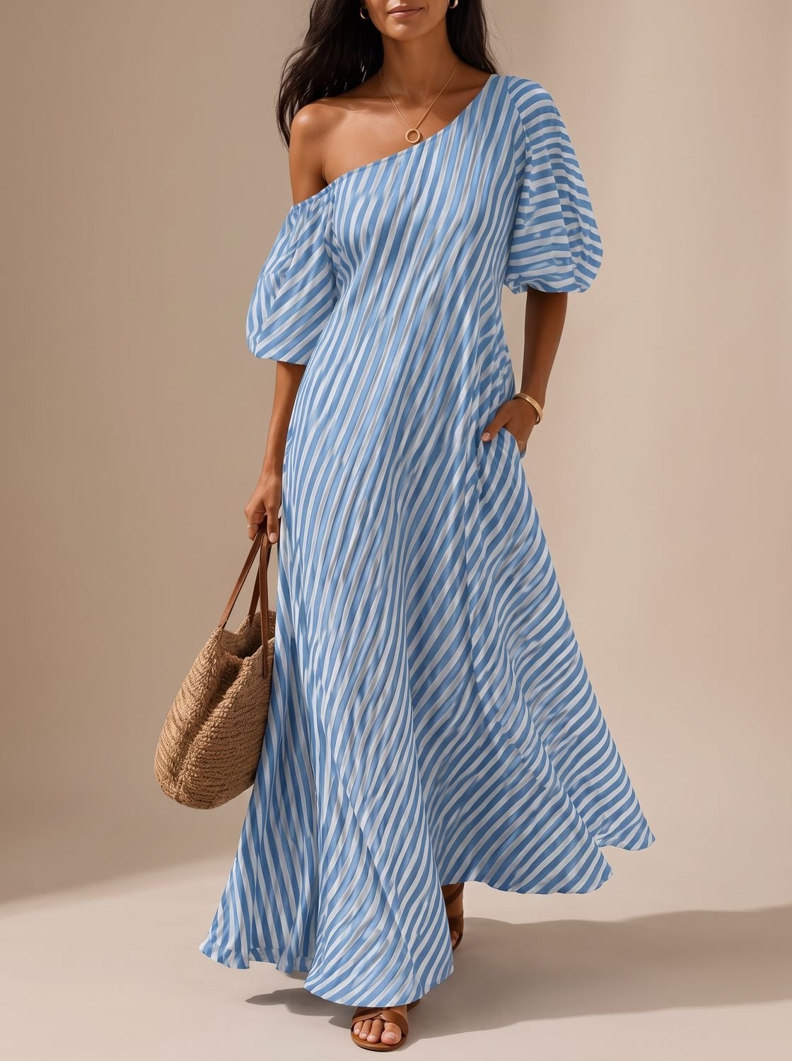 Women's striped one-shoulder maxi dress shown from the front