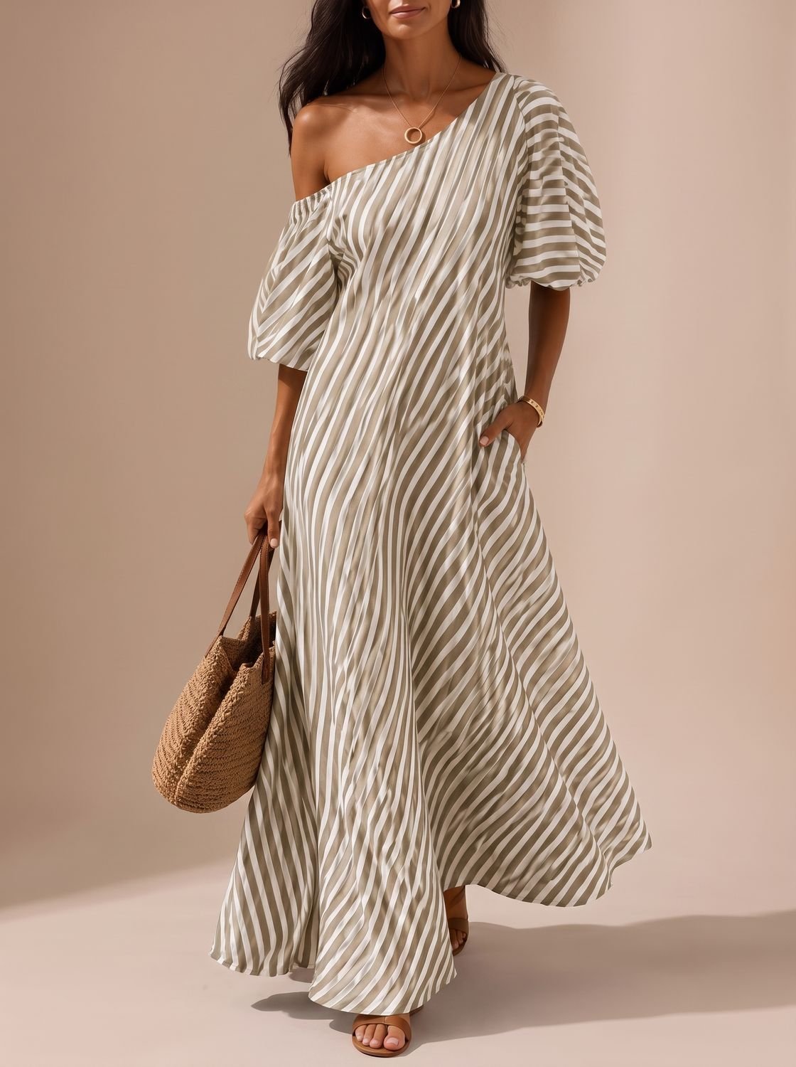 Full-length view of a flowy striped maxi dress
