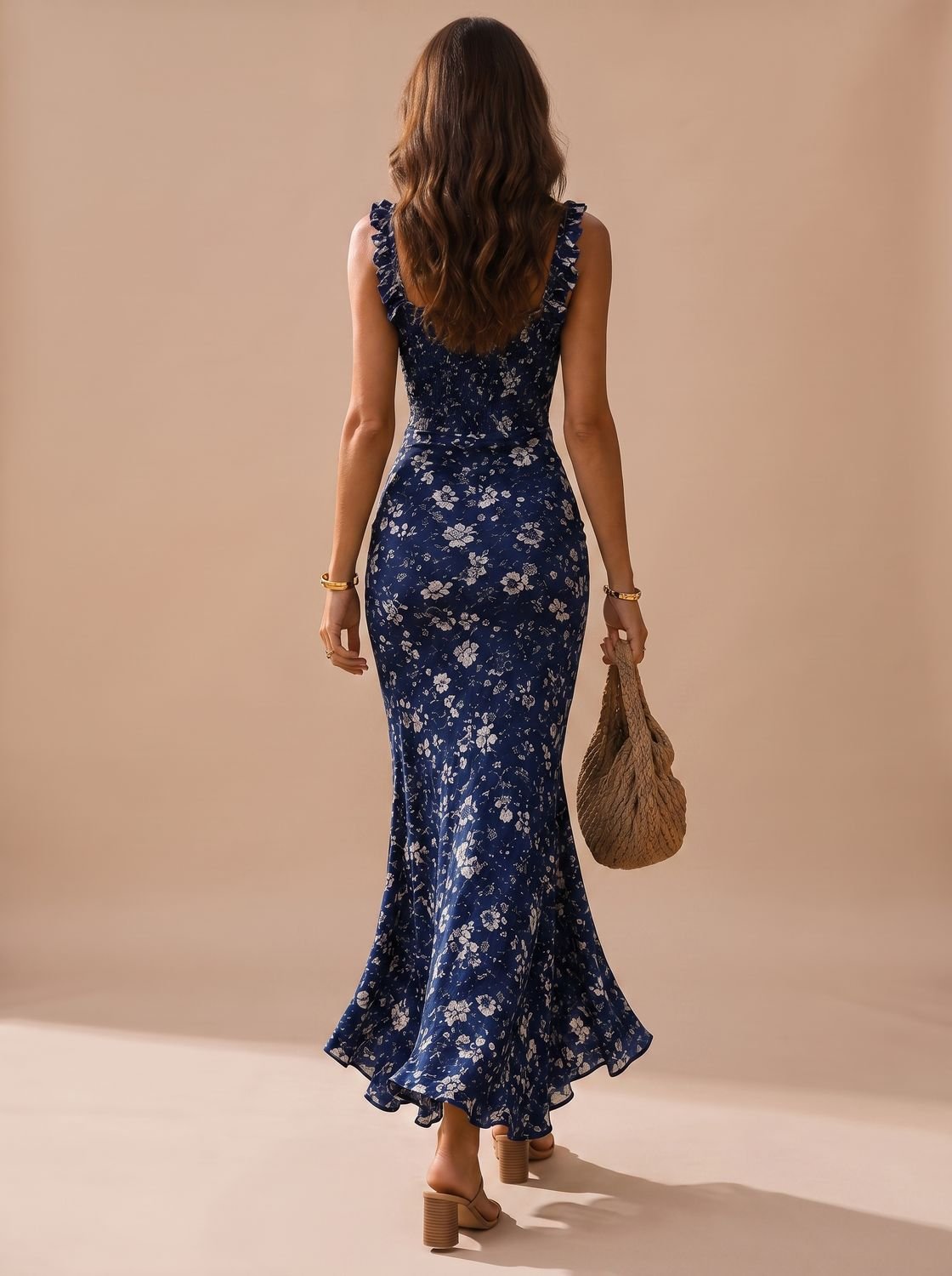 Full-length view of the flowy floral dress styled for a boho look