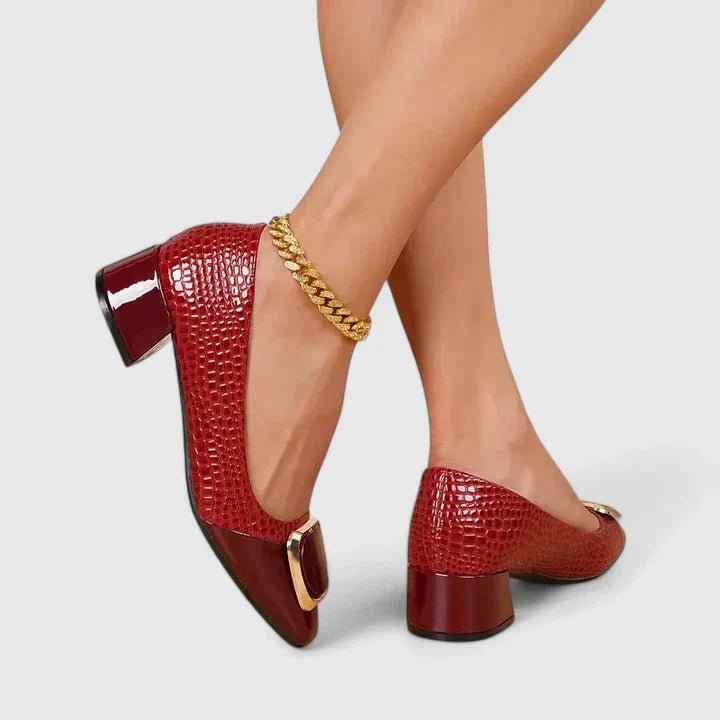 Side view of women's croc-embossed block heel loafers