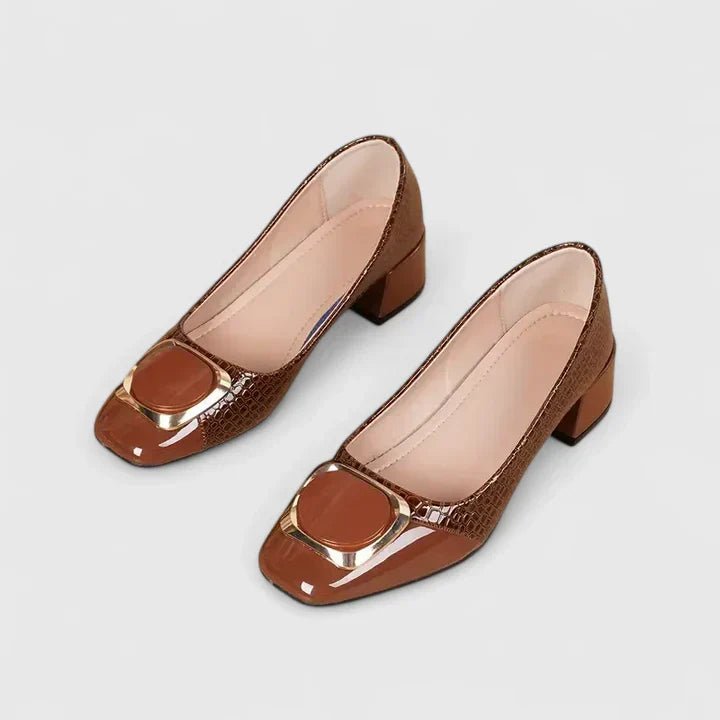 Pair of women's croc-embossed block heel loafers