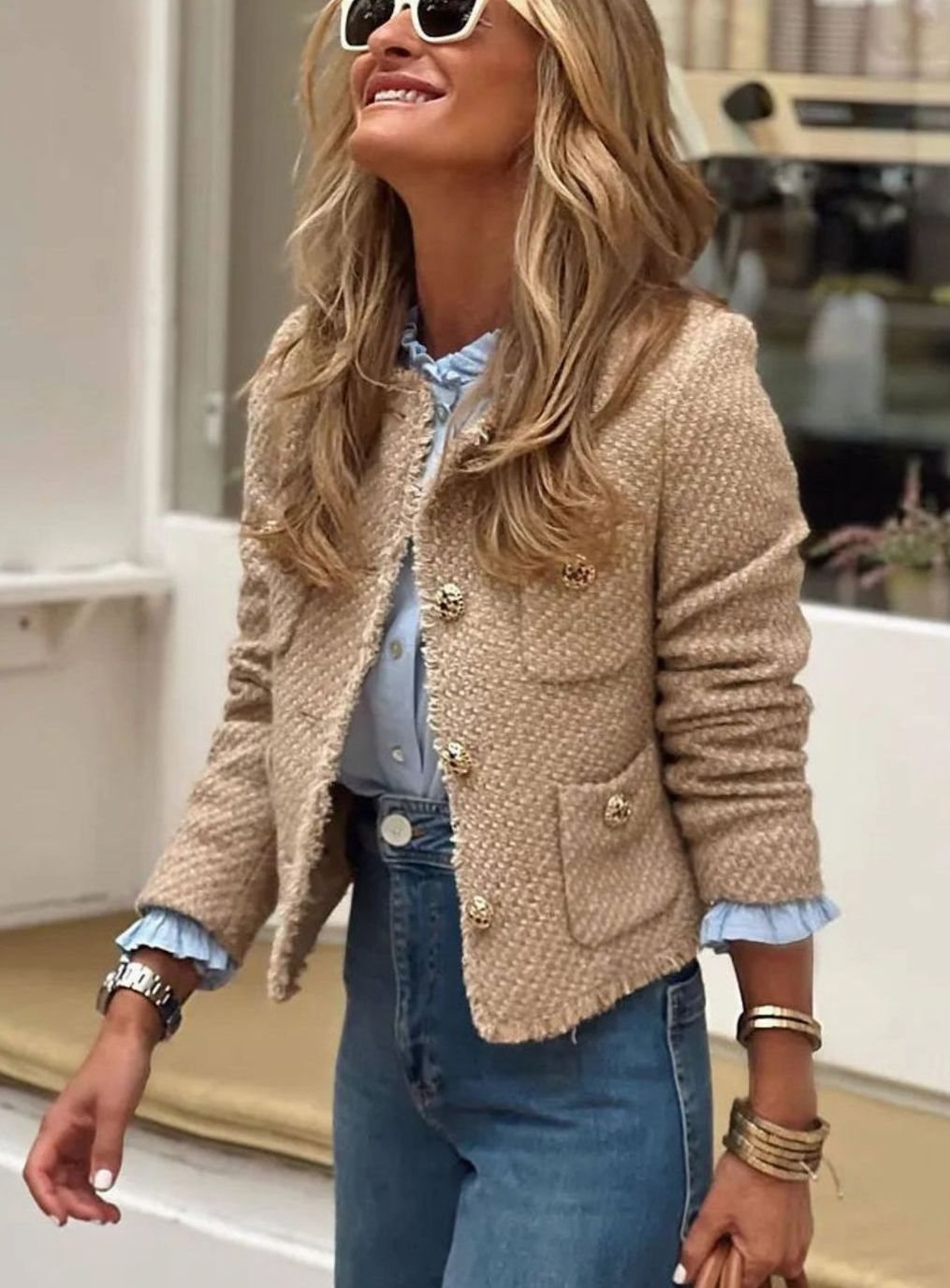 Women's cropped tweed blazer jacket with a button-front closure