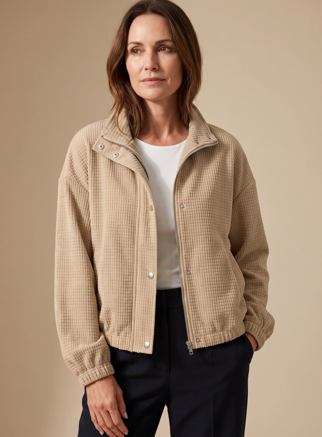 Women's cropped jacket styled as a casual layering piece with a stand collar