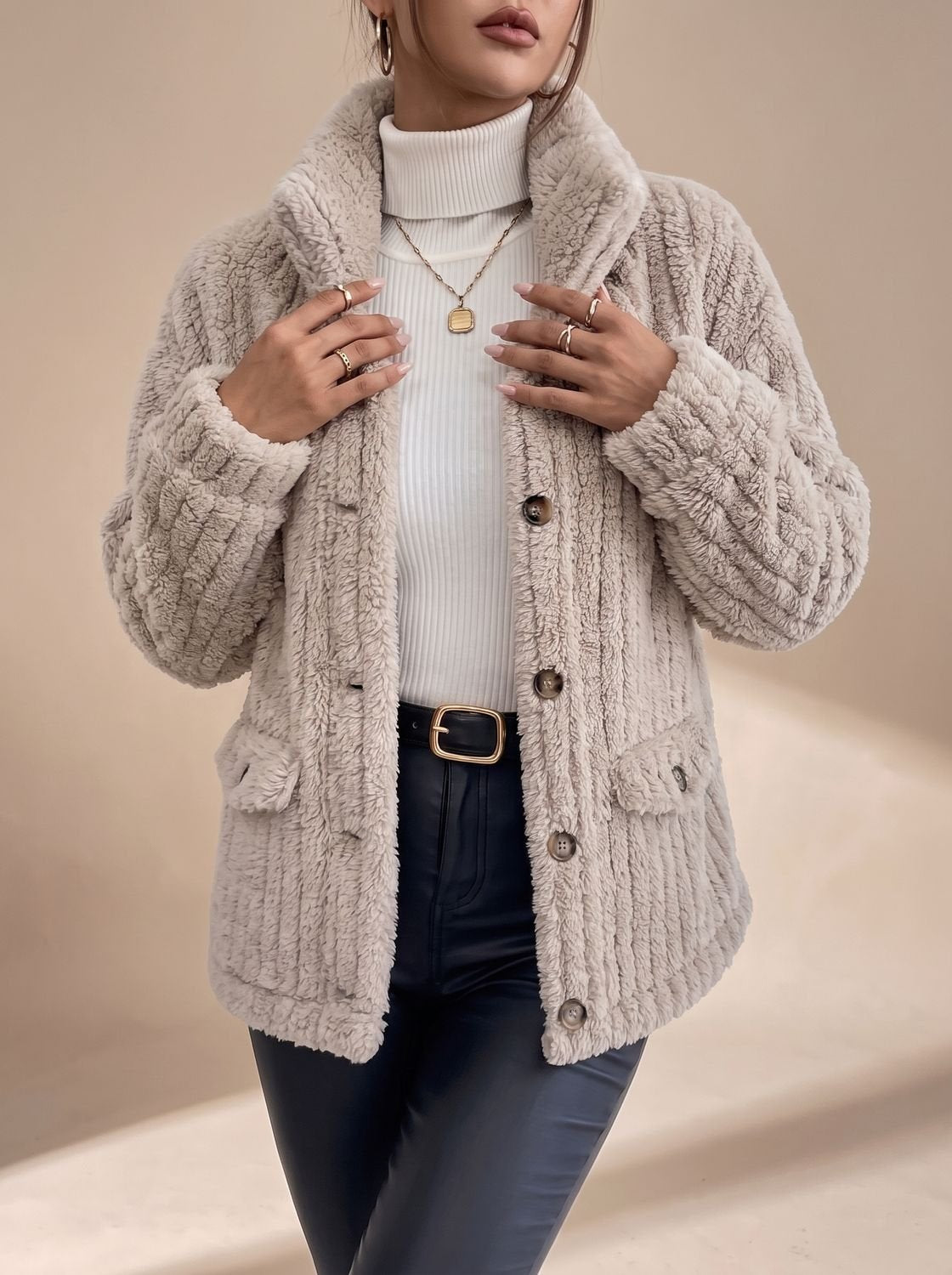 Women's faux fur coat styled as a cozy cold-weather layer