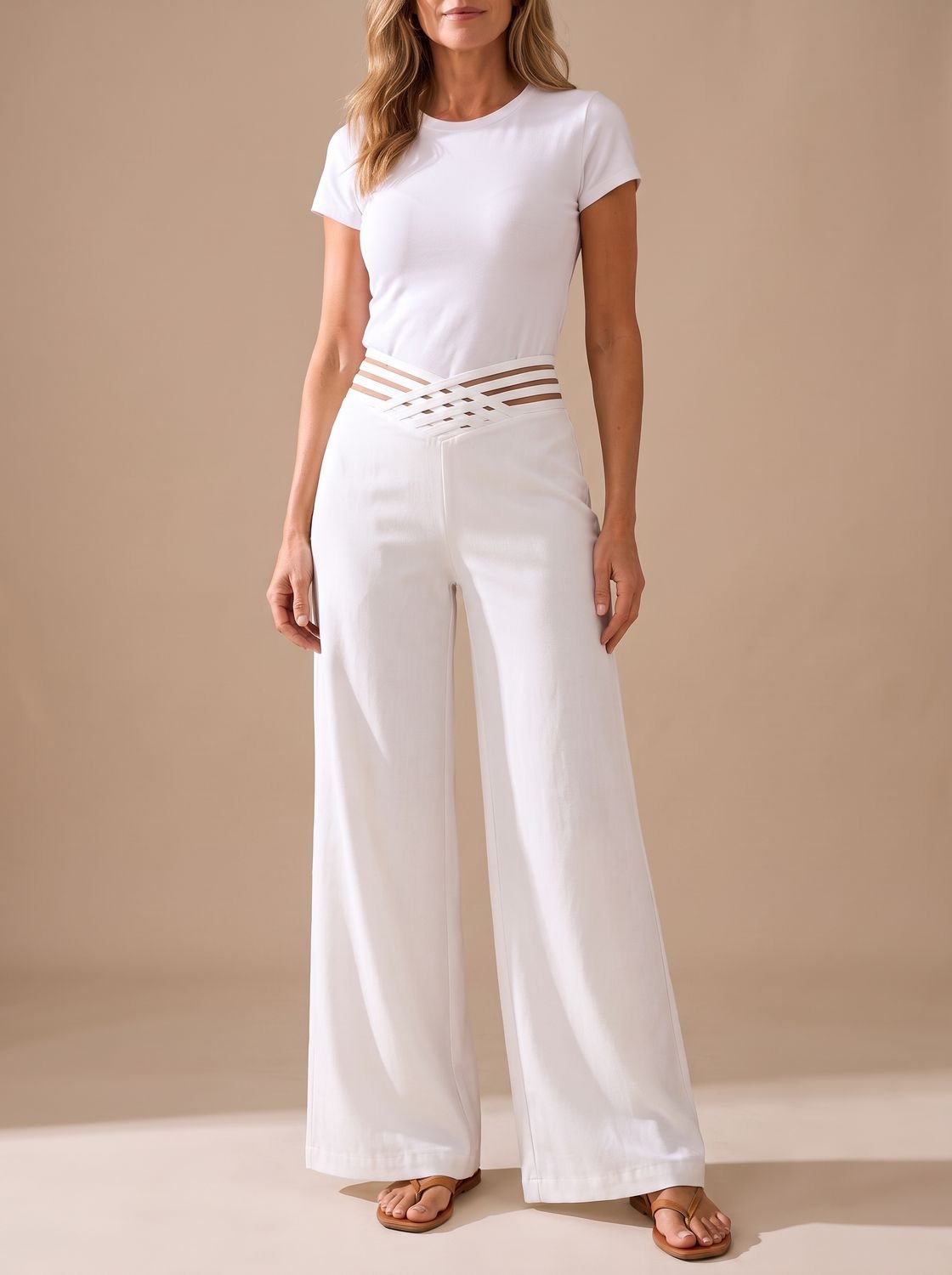 Close-up of the crossover waistband on women's wide-leg pants