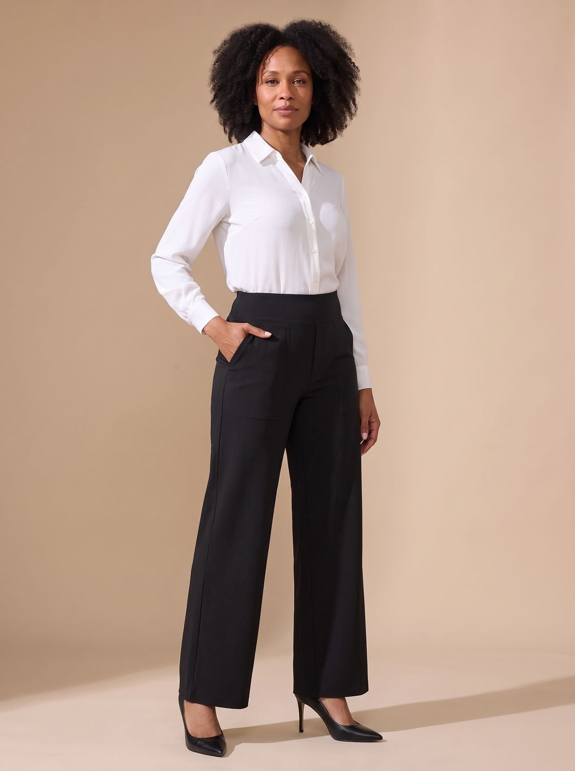 Women's stretch trousers highlighting the flowing wide-leg shape