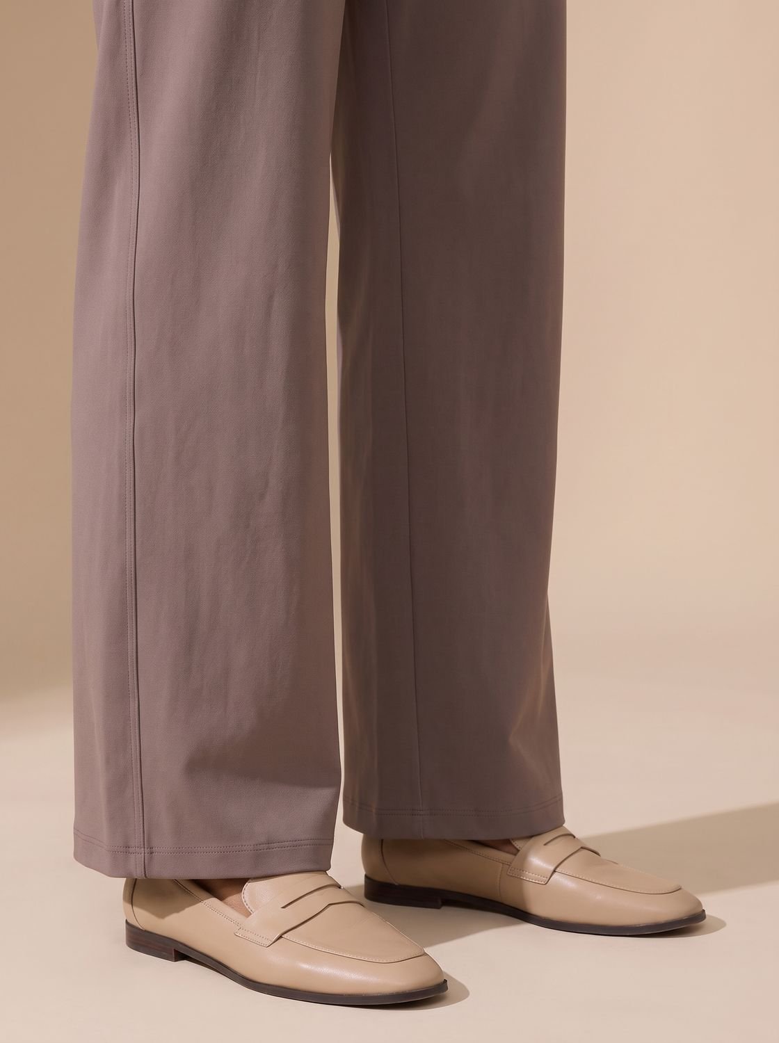Close-up of the high waistband on women's stretch pants
