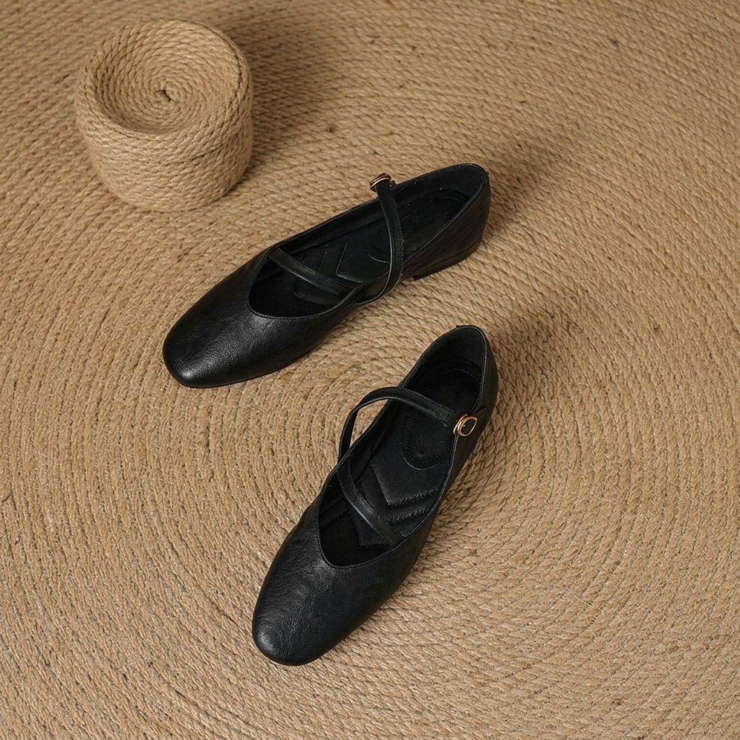 Angled view of leather Mary Jane flats highlighting the buckle straps
