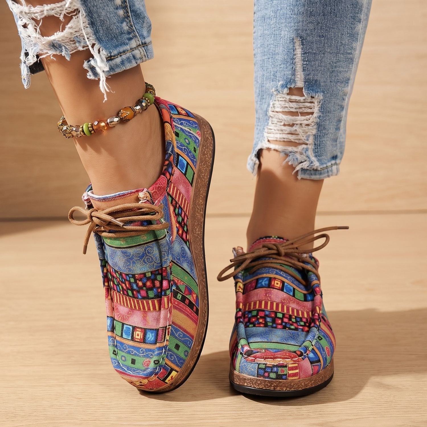 Close-up of the textured patchwork upper on women's comfort sneakers