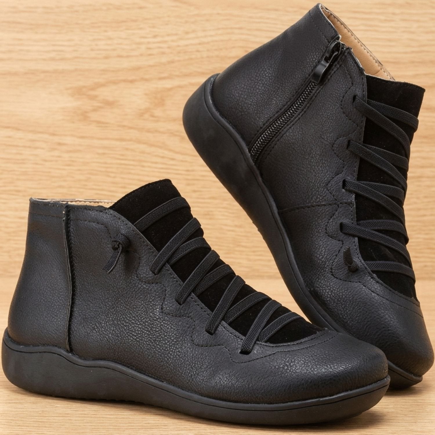 Close-up of women's ankle boot laces and side zipper
