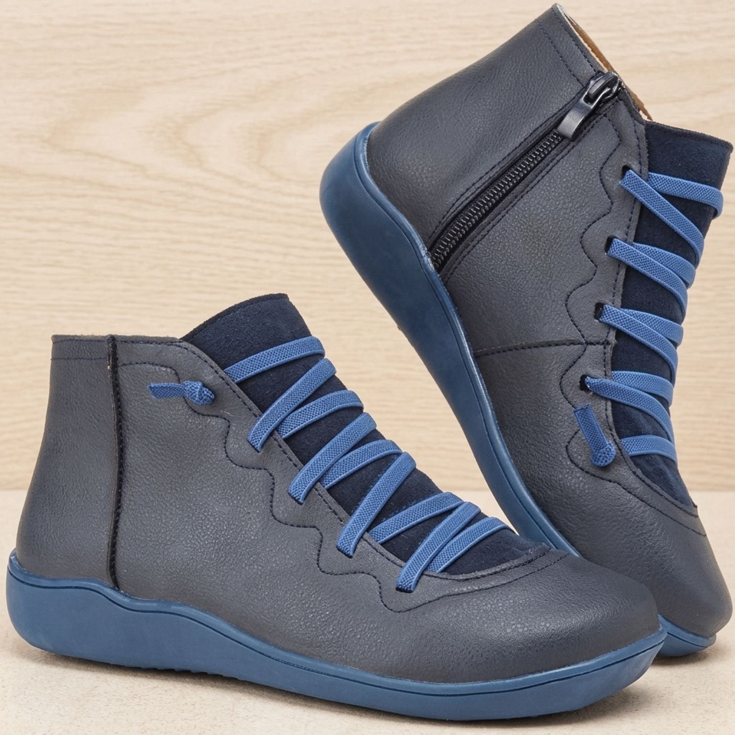 Side view of a women's ankle boot with a convenient zipper