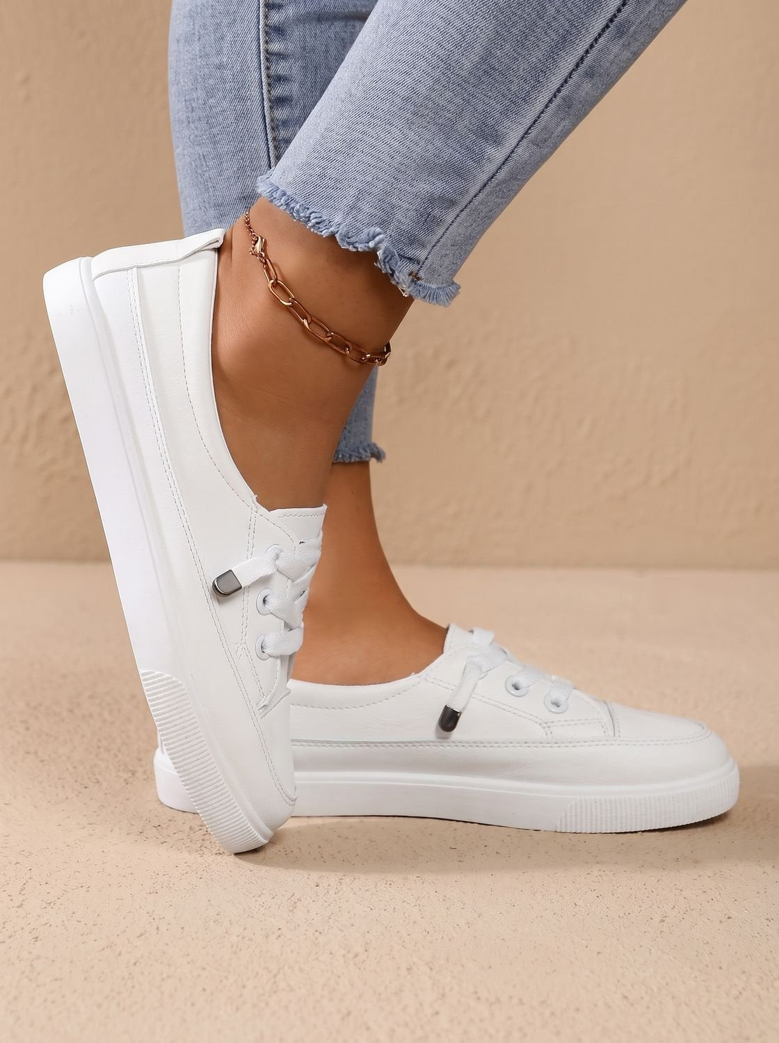 Front view of women's orthopedic lace-up sneakers