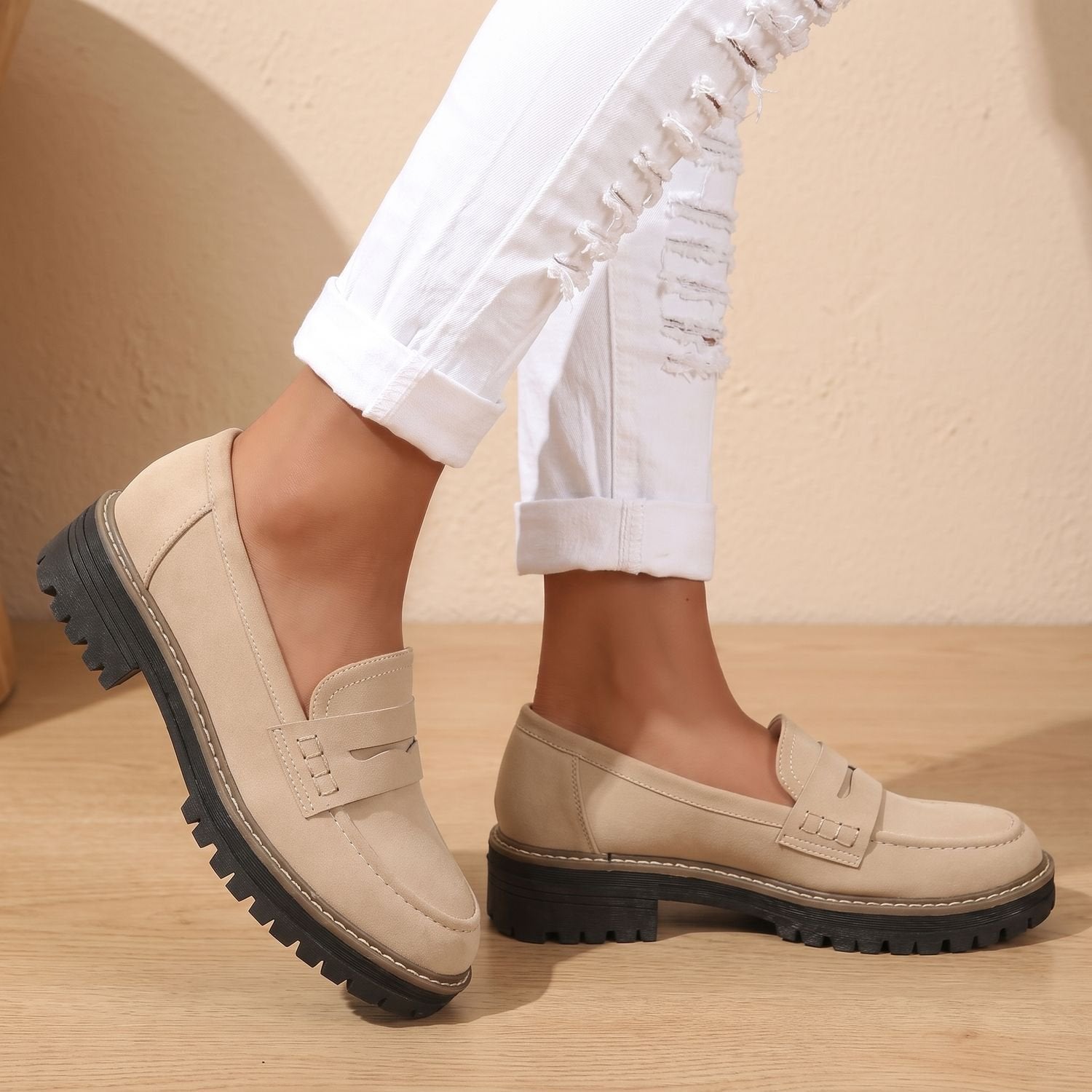 Women's cushioned platform penny loafers in a classic slip-on design