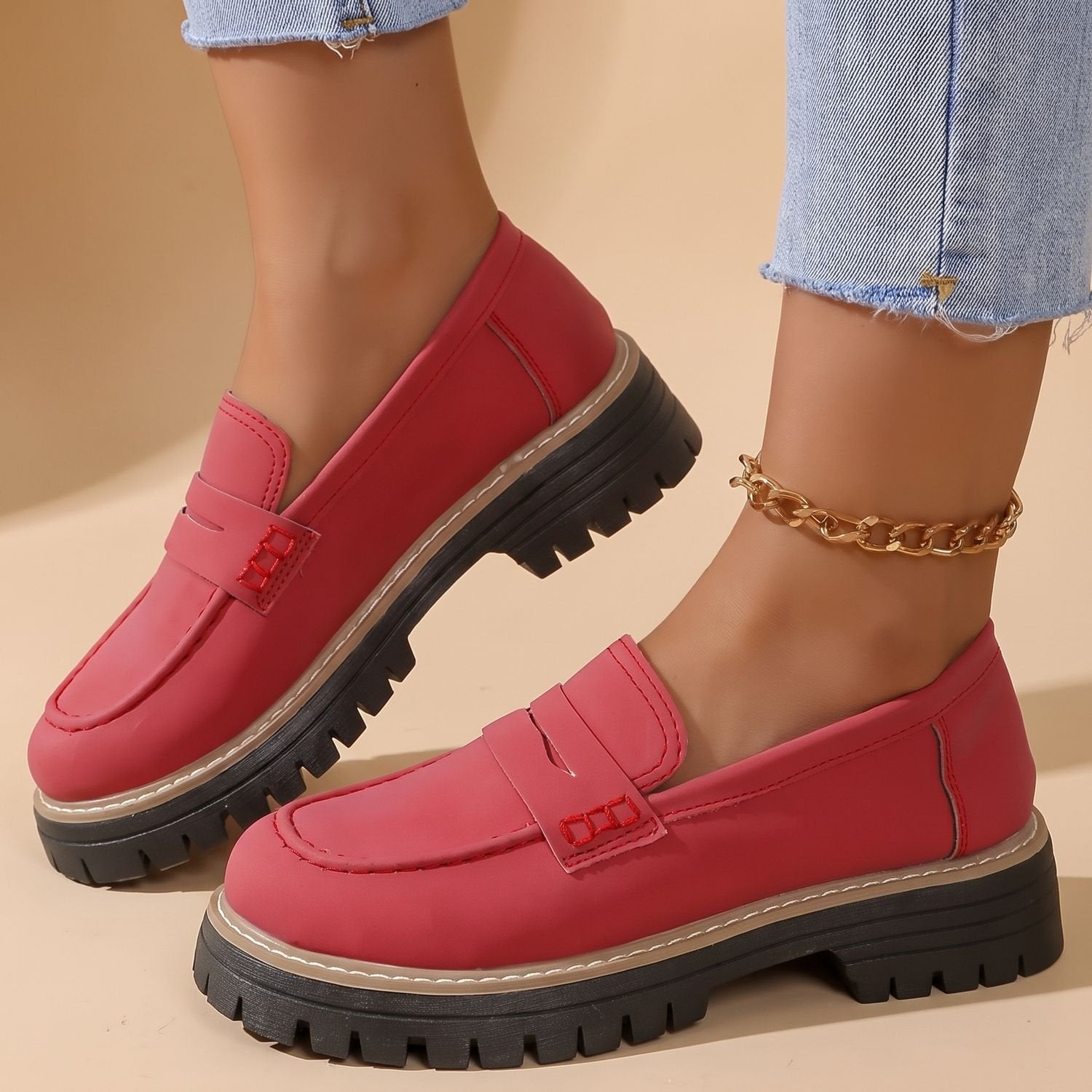 Pair of orthopedic-inspired women's penny loafers viewed from above
