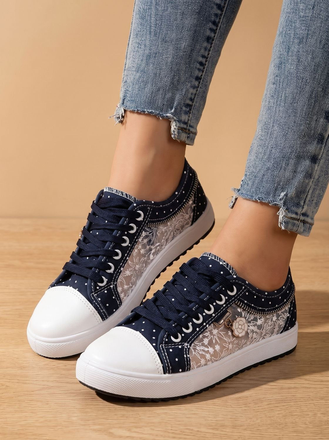 Pair of women's orthopedic floral mesh platform sneakers